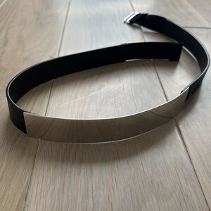 Silver metal and black leather belt with elastic back